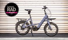 Titelbild für Artikel: Momentum Compakt E+ 1 E-Bike im Test: Komfort-Wunder mit Vollautomatik
